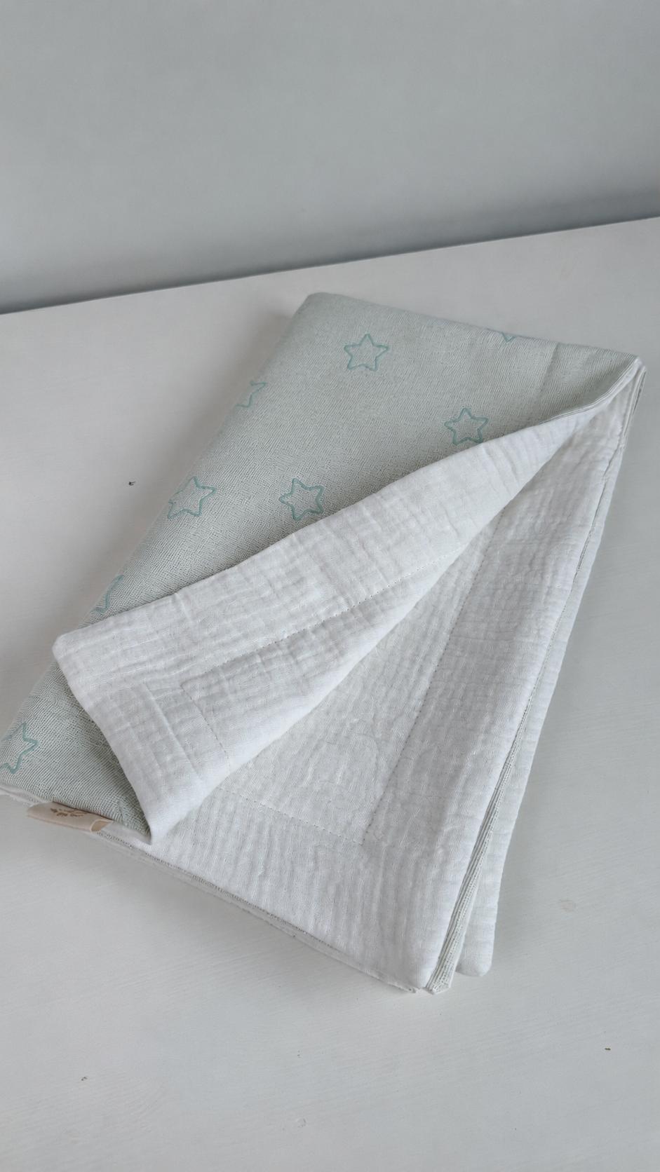 MANTA CON MUSELINA Y JACQUARD ESTRELLAS VERDE MENTA