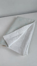 MANTA CON MUSELINA Y JACQUARD ESTRELLAS VERDE MENTA